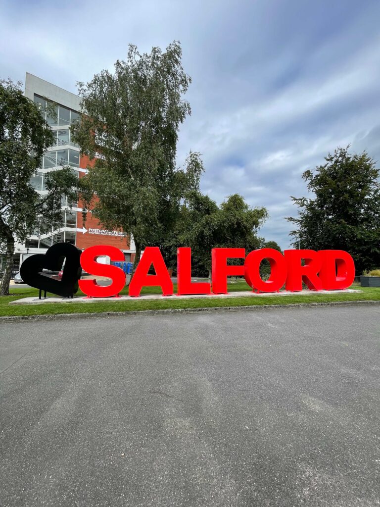 "Love Salford" logo